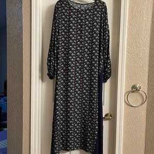 Maxi dress with asymmetrical detail in front of the dress. Size 1X
